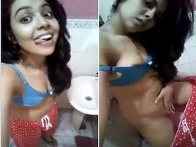 Pretty girl shows off her body in a video