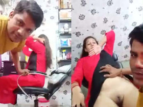 A romantic couple gets intimate at the beauty salon