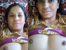 Indian aunt flaunts her large breasts and intimate area