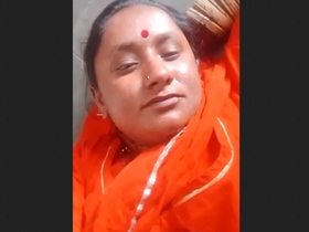 A village woman reveals her intimate parts for her spouse in a video