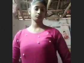 Village bhabi displays her large breasts in a sensual video