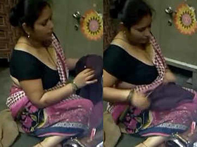 Sizzling aunt flaunts her ample cleavage