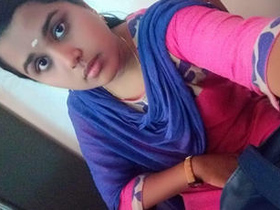 A pretty Indian girl displays her naked body on webcam