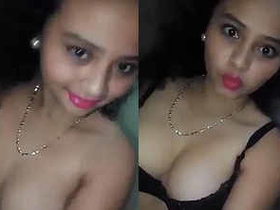 Young and attractive woman undresses for WhatsApp recording