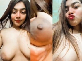 Watch a stunning Bangladeshi girl flaunt her massive breasts