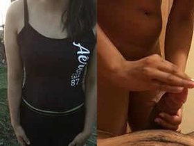 A seductive woman performs oral sex and has intercourse with a male partner outdoors