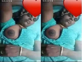 Older aunt flaunts her large breasts during video chat