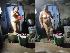 Mature Desi woman records her bathing on hidden camera