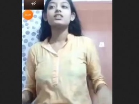 Beautiful girl flaunts her big tits and pussy in a steamy video