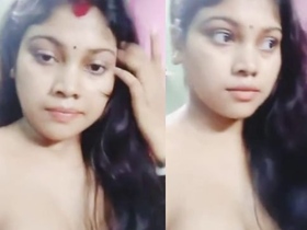 Boudi flaunts her new boobs in a seductive video