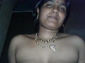 Married Indian bhabhi rides her hairy pussy in a steamy video