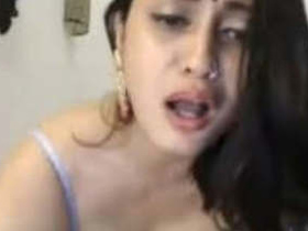 Watch a sexy aunty show off her body and have a fun chat in this video