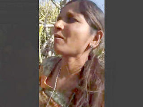 Randi engages in outdoor sex with a client in the doggie position