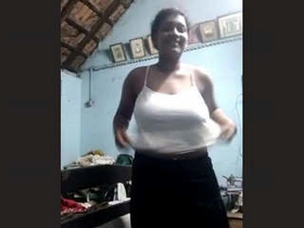 Tamil babe flaunts her big boobs in a solo video