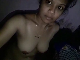 Aroused Indian woman pleasures herself on camera