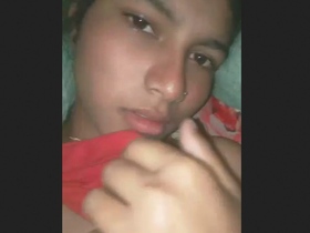 This video features an adorable girl engaging in intense sexual activity