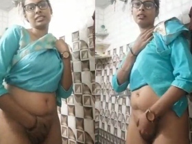 A tall Punjabi girl stripping down and exposing her naked pussy on camera