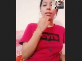Indian wife proudly displays her large breasts on camera