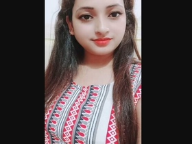 Adorable girl reveals her alluring breasts in a monetized video
