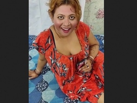 Older Indian woman engages in role-playing sex