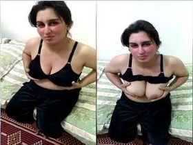 Indian wife flaunts her breasts in online video