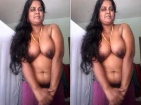 Tamil bhabhi reveals her big boobs in a steamy video