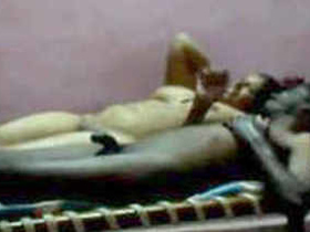 Naked couple enjoys sensual massage on bed after intercourse