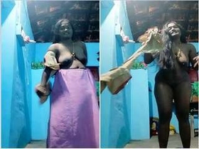 Busty Bhabhi strips and flaunts her assets