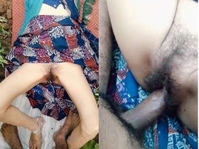 Desi couple enjoys outdoor sex on a bed in public