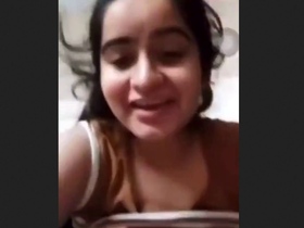Arousing video chat with a stunning beauty flaunting her ample bosom