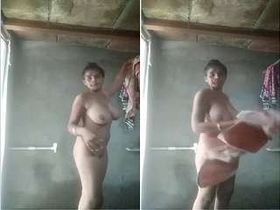 Indian girl with huge boobs taking a bath