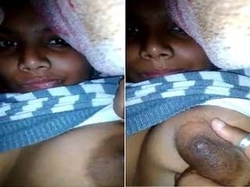 Desi babe teases with her big boobs and pussy on camera