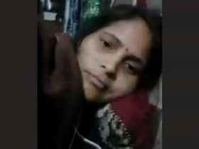 Indian wife flaunts her large breasts during a video chat