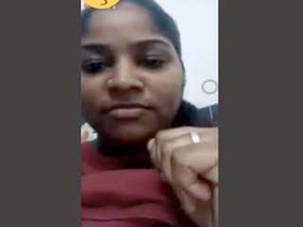 A girl from Tamil origin pleasuring herself through fingering during a video call
