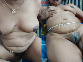 Exclusive video of Indian bhabhi flaunting her boobs and pussy