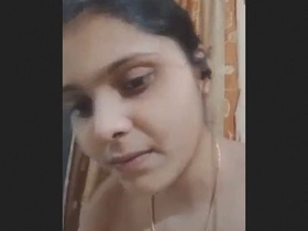 Indian beauty reveals cleavage in seductive display