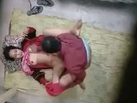 Aromantic encounter of a seasoned couple engaging in fervent lovemaking