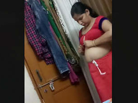 Elderly aunt's breasts revealed while switching outfits