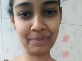 Nude Indian girl takes solo naked selfies without bra