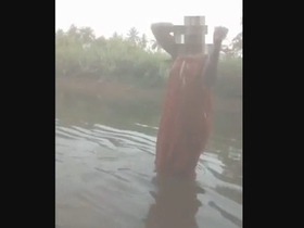 Desi aunt's sensual outdoor bath leads to intimate encounter with lover