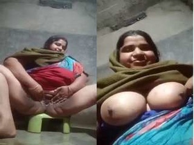 Boudi flaunts her big boobs and pussy in exclusive video