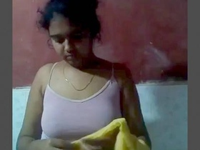 A village girl from India is fondled while bathing
