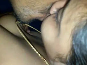 Freshly married couple engages in a heated lovemaking session in their hotel suite