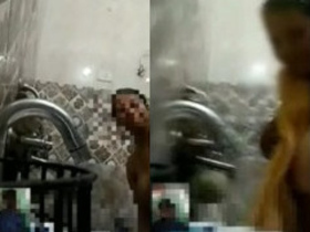 Indian plus-size woman taking a bath during a video chat
