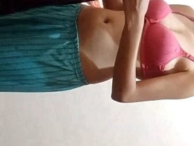 Indian girl exposes her buttocks while bathing