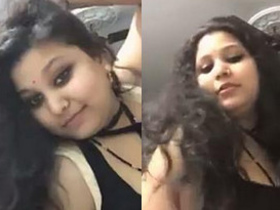 Big-titted Indian bhabi shows off her moves in cleavage-baring outfit
