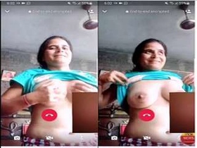 Horny Indian bhabhi flaunts her boobs and pussy in video call
