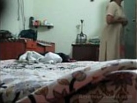 Banares vali gives a blowjob to a topless woman