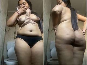 Indian babe flaunts her naked body and takes a shower in part 1