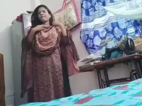 Seductive girl fondles her body while flaunting her alluring figure